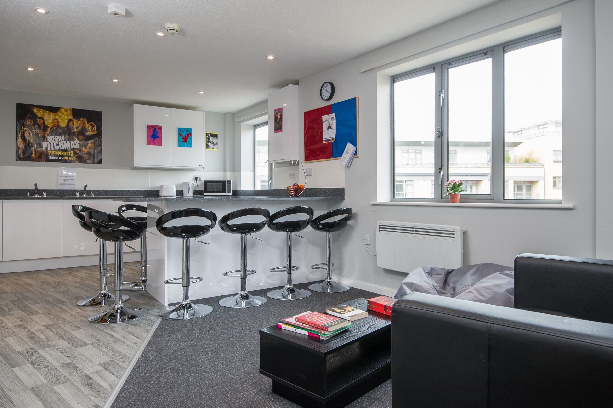 Cambridge_Abbey College_cluster kitchen breakfast bar area sofas and worktops